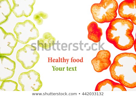 ストックフォト: Sliced Green And Red Pepper Rings Paprika On A White Background Decorative Frame Of Pepper Isolate