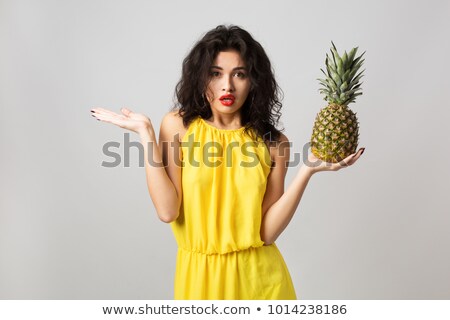 Stockfoto: Surprised Model With Pineapple