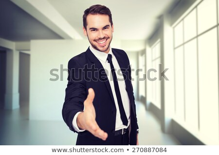 Foto stock: Modern Business Man With Arm Extended To Handshake