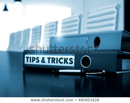 Foto d'archivio: Tips And Tricks On Office Binder Blurred Image 3d