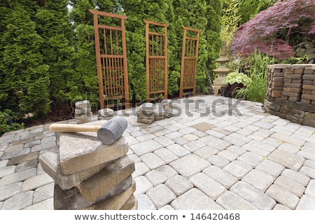 Foto stock: Stack Of Pavers On Backyard Garden Patio