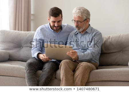 Foto stock: Father And Son On The Computer