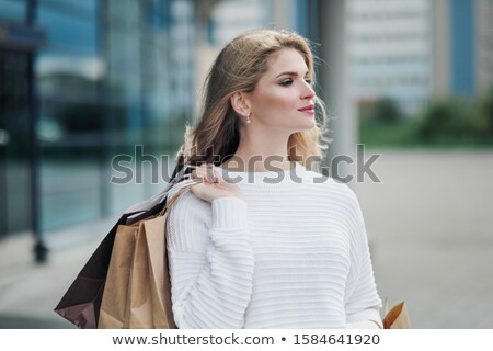 ストックフォト: Blond Woman Against Shop Window