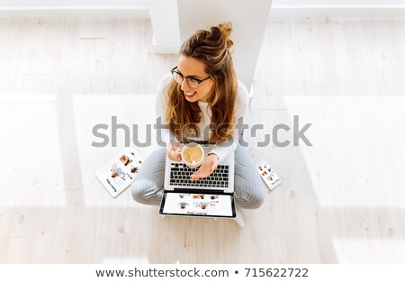 Stok fotoğraf: Top View Portrait Of A Girl Drinking Coffee In Office