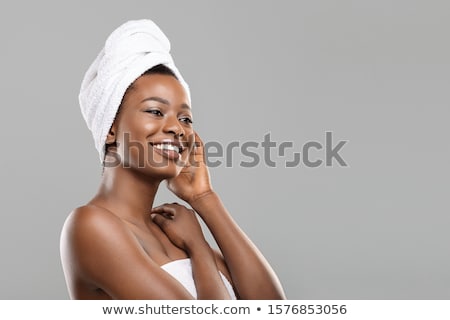 Stockfoto: Ortret · van · een · vrouw · met · een · handdoek · op · het · hoofd