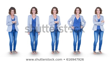 商業照片: Digital Composite Image Of Businesswoman Standing By Various Icons Against Gray Background