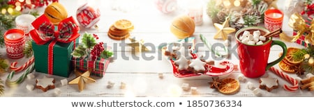 Stockfoto: Hot Chocolate Christmas Gift And Candles On Table