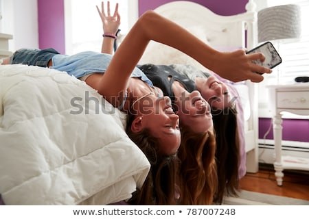 ストックフォト: Teenage Girls Taking Selfie By Smartphone At Home