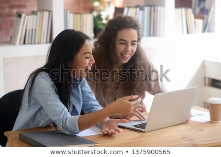 Stock fotó: Young Successful Multicultural Students Or Employees Looking At Touchpad Display