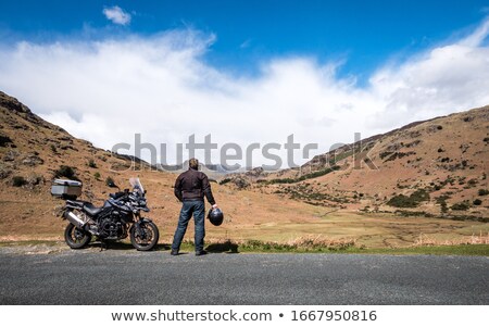 Stockfoto: Taking Break From Motorcycle Trip
