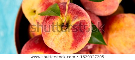 Zdjęcia stock: Banner Of Ripe Peaches In A Bowl Basket On The Blue Table