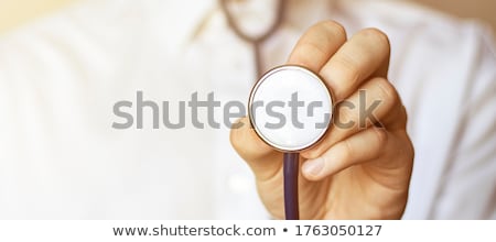 Stock fotó: Doctor Holding Stethoscope