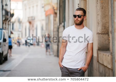 [[stock_photo]]: Handsome Muscular Man Posing In White Shirt