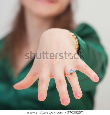 Woman Shows New Ring With Blue Gem Stockfoto © pzAxe