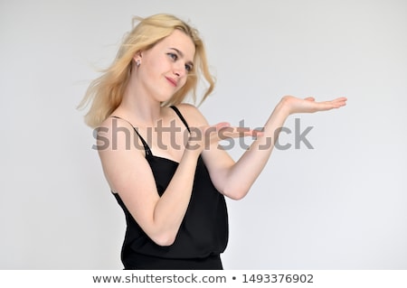 Stok fotoğraf: Woman With Long Curly Hair Holding Cigar On A Dark Background M