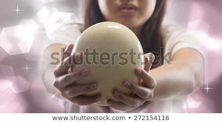 ストックフォト: Blond Woman Painted A Green Egg