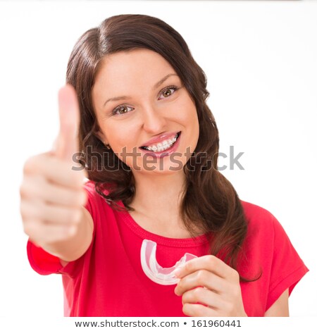 Stok fotoğraf: Closeup Portrait Of Charming Woman Wearing Orthodontic Ceramic W