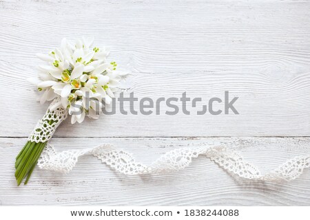 Stok fotoğraf: Wooden Frames For A Wedding Christening With White Beautiful Pe