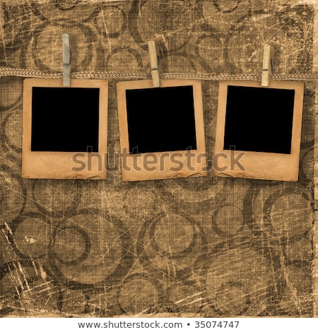 Stockfoto: Old Photoframes Are Hanging On The Abstract Background