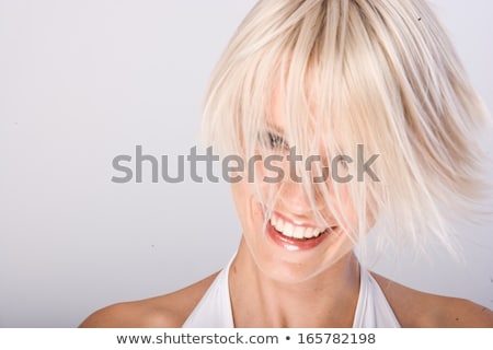 Stockfoto: Charismatic Vivacious Young Blond Woman