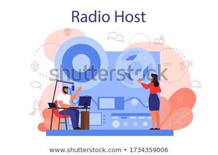 Stock fotó: Radio Host Speaking Through A Microphone