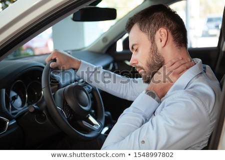 Foto d'archivio: Young Businessman Having Neck Pain