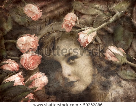 Foto d'archivio: Old Grunge Torn Frame On The Ancient Background With Roses