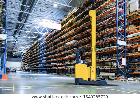 Foto stock: Reach Truck In A Warehouse