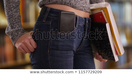 Сток-фото: Cellphone In Womans Pocket