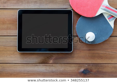 Stock fotó: Close Up Of Tennis Racket With Ball And Tablet Pc