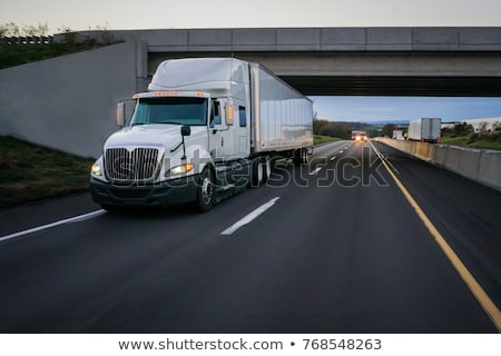 Stock photo: Commercial Trailer Truck In Motion On Freeway