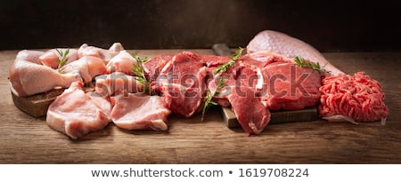 Foto stock: Raw Fresh Meat Steak With Salt And Pepper