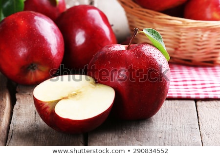 Foto stock: Fresh Red Apples In Wicker Basket On Wooden Table