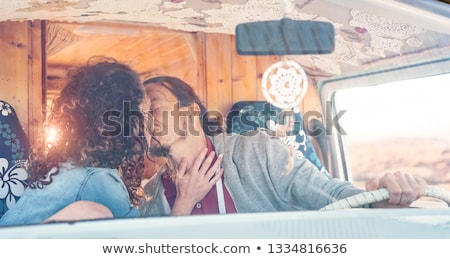 Zdjęcia stock: Young Couple Having Tender Moments And Kissing On The Beach At S