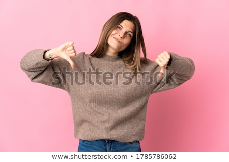 Stock fotó: Casual Woman With Thumbs Down Gesture