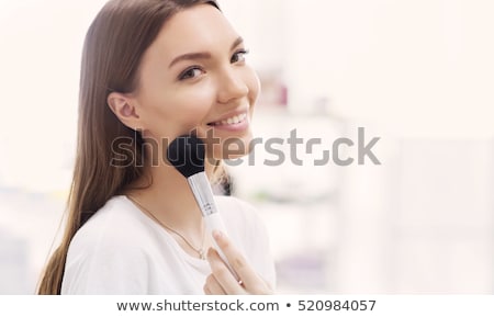 Zdjęcia stock: Woman Applying Make Up