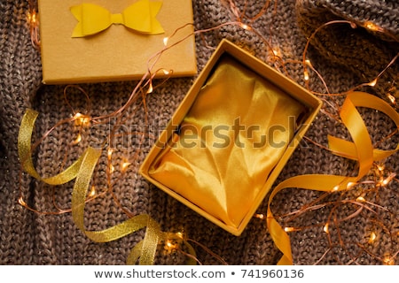 Stock fotó: Beautiful Golden Gift Box With Red Bow Isolated On White