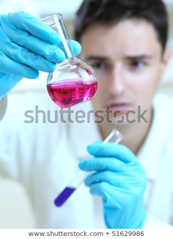 Stockfoto: Young Male Researcher Carrying Out Scientific Research In A Lab