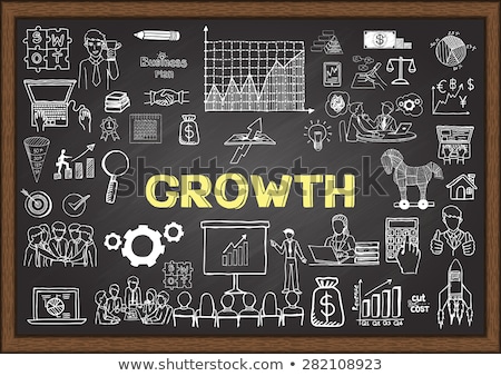 Foto stock: Economic Forecasting Concept Hand Drawn On Chalkboard