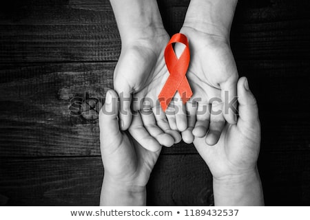 Stockfoto: World Aids Day Background With Red Ribbon Of Aids Awareness