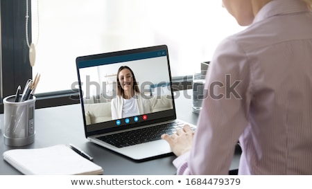Foto stock: Businesswoman Sitting At The Table Relaxed