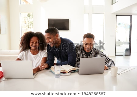 Zdjęcia stock: Father Helping Son Do Homework Parent Helps His Child