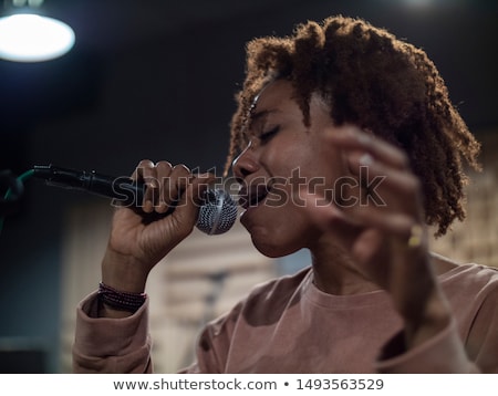 Stock fotó: Music Performance Singer On Stage Singing Songs