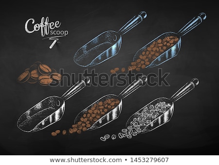 Foto d'archivio: Chalked Collection Of Metal Coffee Scoops