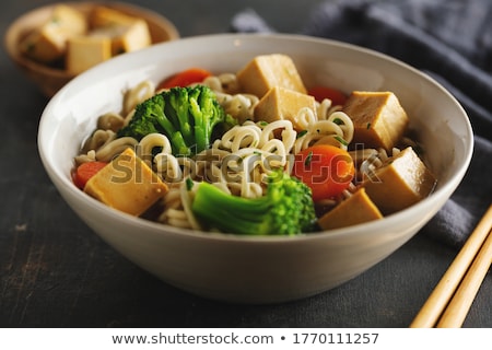 Foto d'archivio: Vegetarian Asian Vegetable Salad Served In A Bowl In Japanese Re