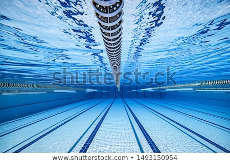 Stock photo: Triathlon Fit Athlete Training In Swimming Pool Lane At Outdoor Stadium Swimmer Man Swimming In Sum