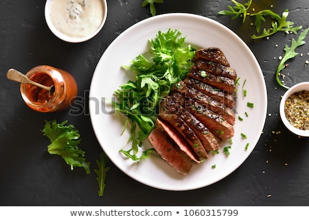 Stok fotoğraf: Roast Beef Slices Over White