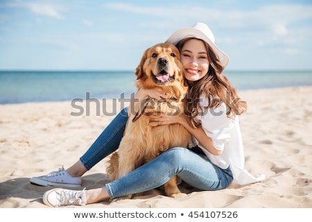 Stockfoto: Young Girl With A Dog