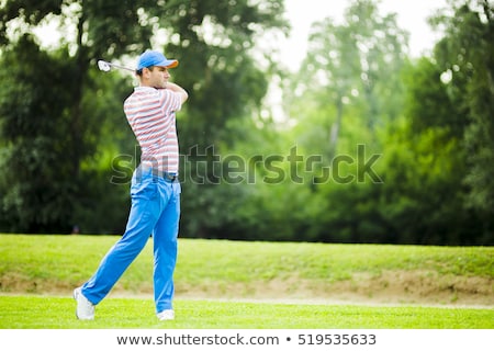 Сток-фото: Golfer Practicing And Concentrating Before And After Shot