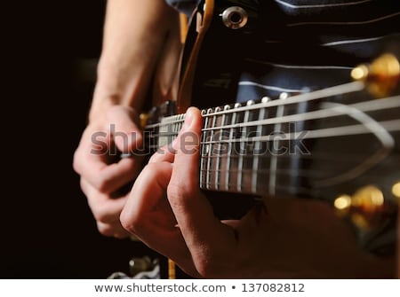 Stock photo: Close Up On Hand And Guitar